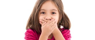 Girl covers her mouth