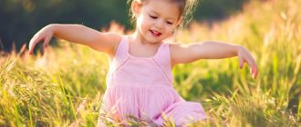 Little girl dancing in the field
