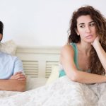 husband turns away from wife