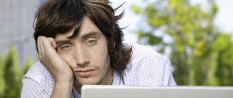 man in front of computer